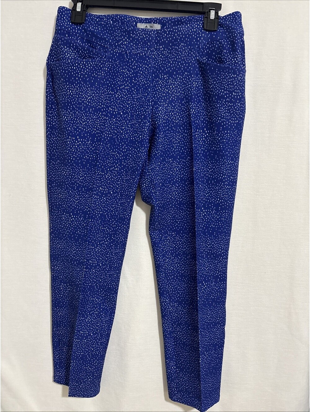 Adidas women's golf pants in blue with a white speckle or geometric print Size S